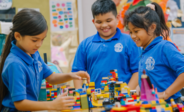 Students building with legos